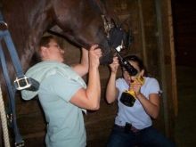 Beth and Dr. Lund performing a powerfloat (dental)